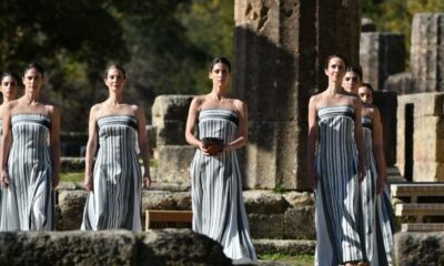 La ceremonia de entrega oficial será el 4 de diciembre en el estadio Panatenaico de Atenas, desde donde la llama recorrerá 12 mil kilómetros por Italia, incluyendo ciudades emblemáticas y el sitio arqueológico de Pompeya.