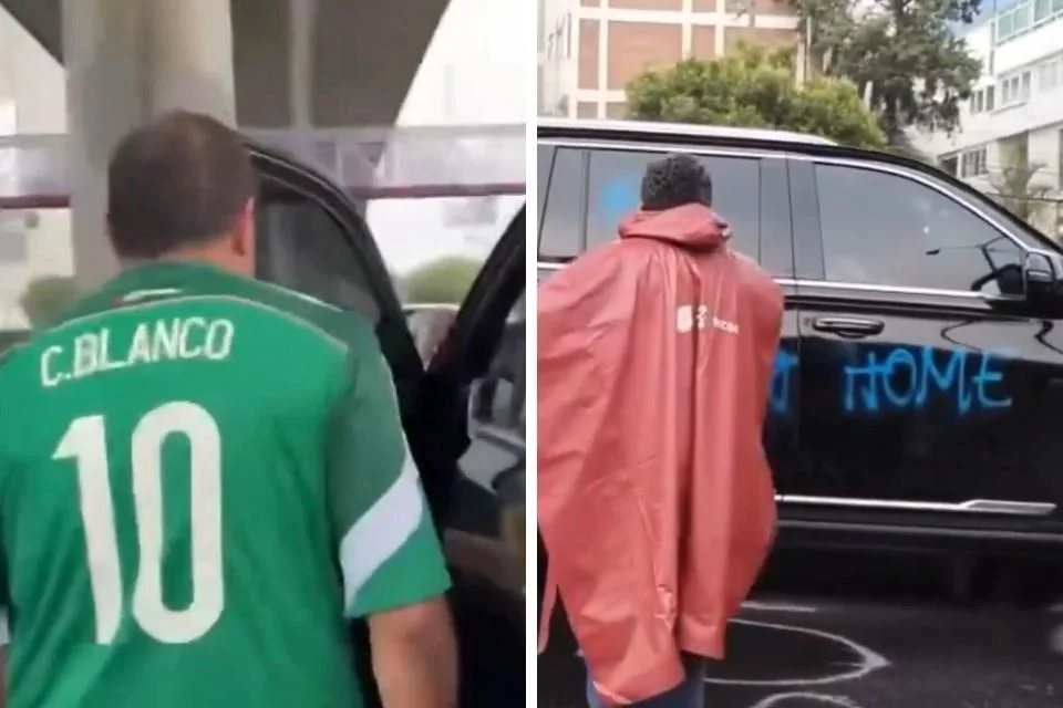Blanco descendió brevemente del vehículo vestido con el jersey de la Selección Mexicana y encaró por unos instantes a algunos de los manifestantes